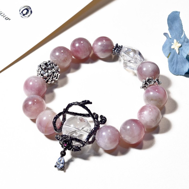 Rose quartz with roses wrapped around beads and white crystal bracelet for attracting peach blossoms.