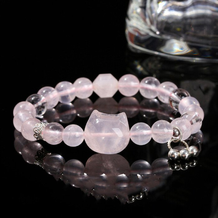Natural Mozambique starlight rose quartz cat head bracelet.