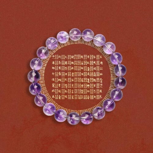 Amethyst Super Seven crystal round bead bracelet. Purple rutilated quartz bracelet.