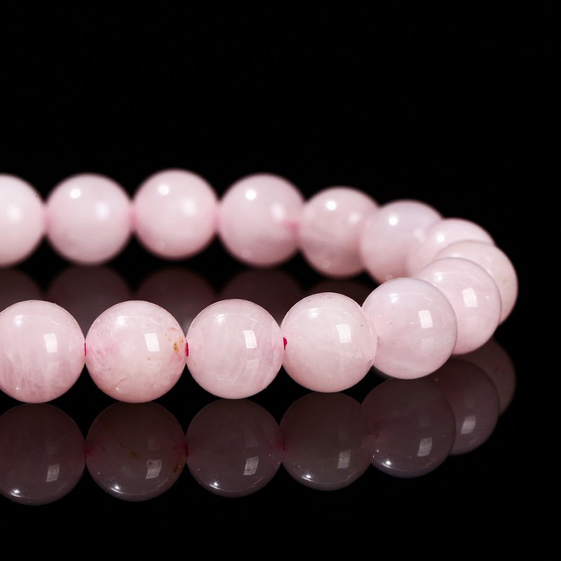Lively Natural full-fleshed rose quartz bracelet. - taoistcrystal.com Lively Natural full-fleshed rose quartz bracelet.