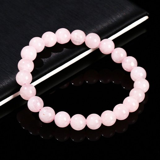 Lively Natural full-fleshed rose quartz bracelet. - taoistcrystal.com Lively Natural full-fleshed rose quartz bracelet.