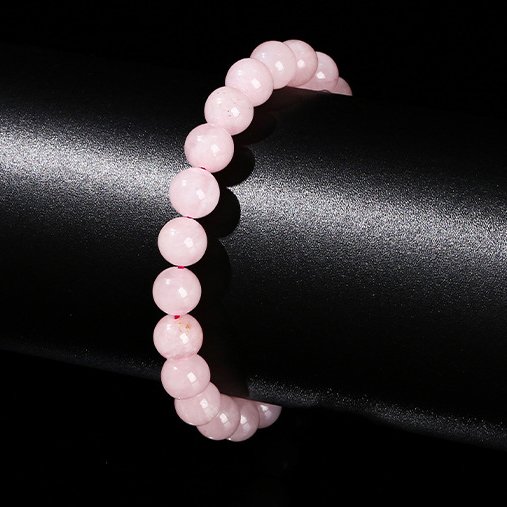 Lively Natural full-fleshed rose quartz bracelet. - taoistcrystal.com Lively Natural full-fleshed rose quartz bracelet.