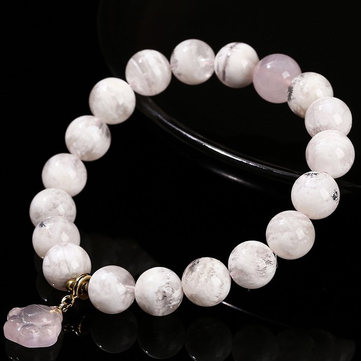 Snowflake phantom crystal round bead bracelet with rose quartz cat claw accessories. - taoistcrystal.com Snowflake phantom crystal round bead bracelet with rose quartz cat claw accessories.
