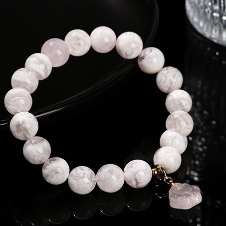 Snowflake phantom crystal round bead bracelet with rose quartz cat claw accessories. - taoistcrystal.com Snowflake phantom crystal round bead bracelet with rose quartz cat claw accessories.