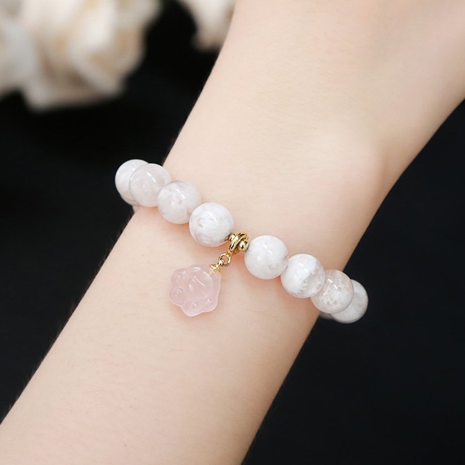Snowflake phantom crystal round bead bracelet with rose quartz cat claw accessories. - taoistcrystal.com Snowflake phantom crystal round bead bracelet with rose quartz cat claw accessories.