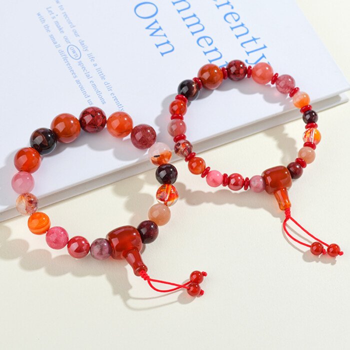 The natural multi-treasure crystal bead string for remedying the lack of the Fire element and changing fortune.