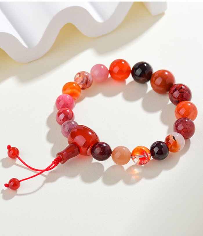 The natural multi-treasure crystal bead string for remedying the lack of the Fire element and changing fortune.