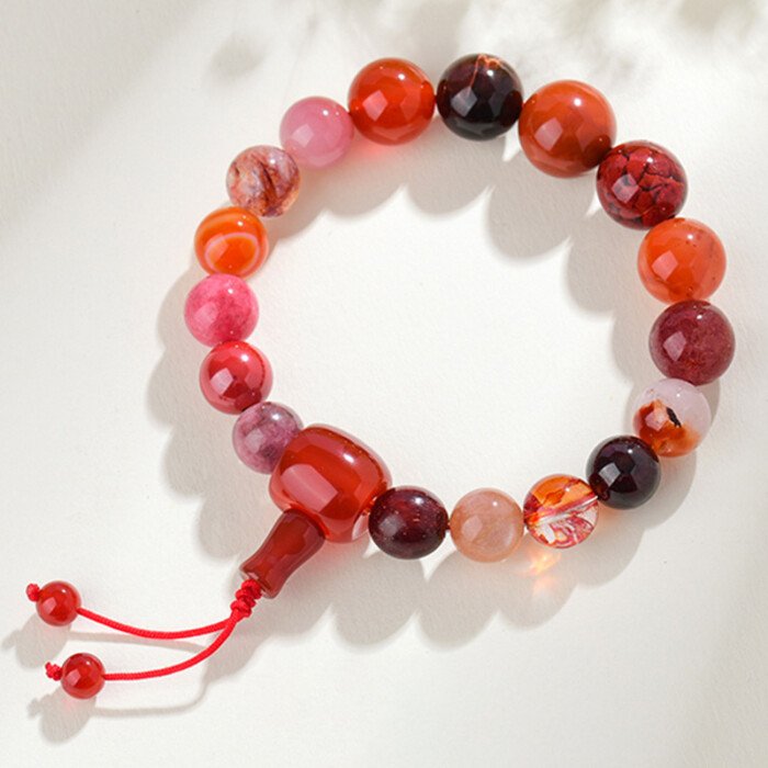 The natural multi-treasure crystal bead string for remedying the lack of the Fire element and changing fortune.
