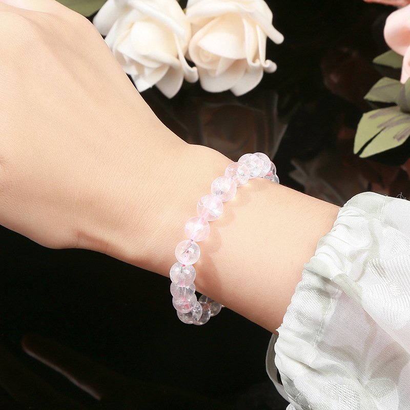 Natural pink Azeztulite crystal bracelet with seven-color starlight. - taoistcrystal.com Natural pink Azeztulite crystal bracelet with seven-color starlight.