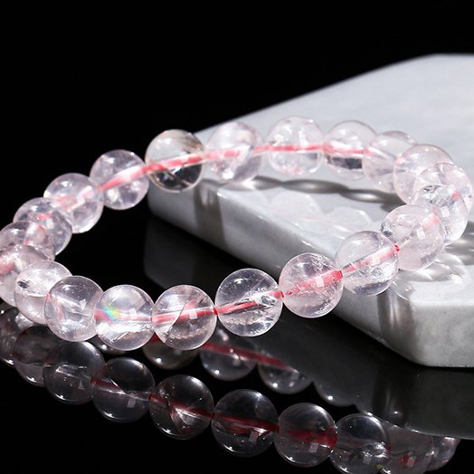 Natural pink Azeztulite crystal bracelet with seven-color starlight. - taoistcrystal.com Natural pink Azeztulite crystal bracelet with seven-color starlight.