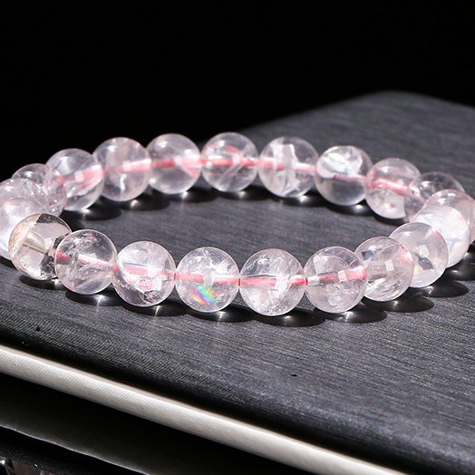 Natural pink Azeztulite crystal bracelet with seven-color starlight. - taoistcrystal.com Natural pink Azeztulite crystal bracelet with seven-color starlight.
