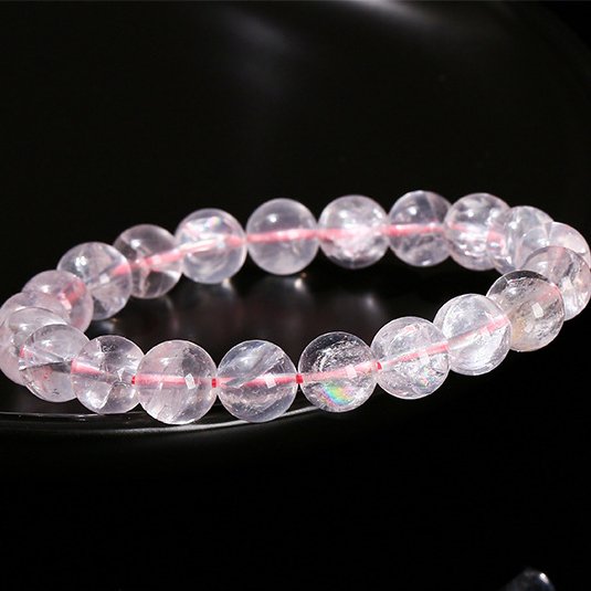 Natural pink Azeztulite crystal bracelet with seven-color starlight. - taoistcrystal.com Natural pink Azeztulite crystal bracelet with seven-color starlight.