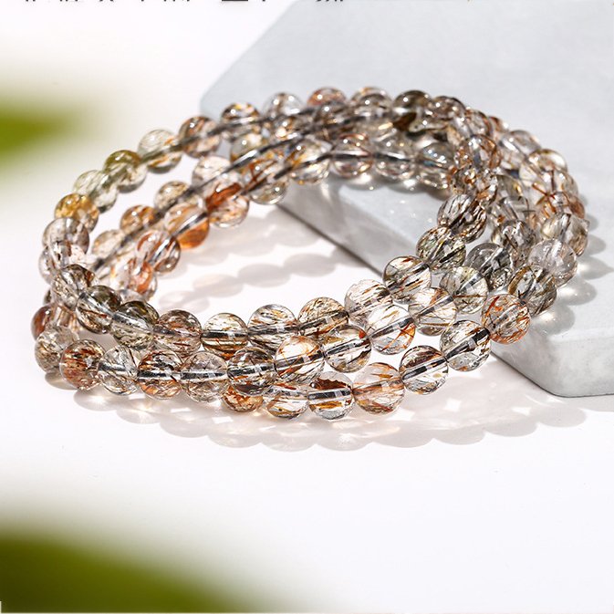 7A natural black gold Super Seven multi-circle bracelet.