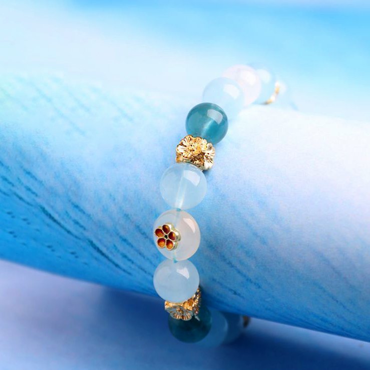 Aquamarine and white phantom quartz crystal bracelet with the design of “Four-sided Fortune Flower” - taoistcrystal.com Aquamarine and white phantom quartz crystal bracelet with the design of “Four-sided Fortune Flower”