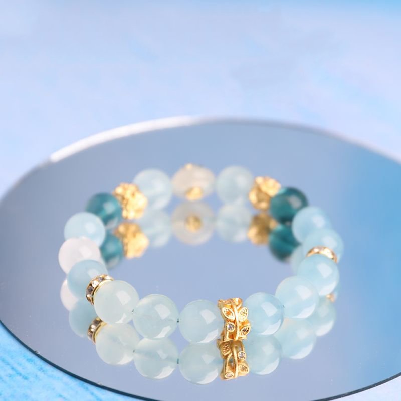 Aquamarine and white phantom quartz crystal bracelet with the design of “Four-sided Fortune Flower” - taoistcrystal.com Aquamarine and white phantom quartz crystal bracelet with the design of “Four-sided Fortune Flower”