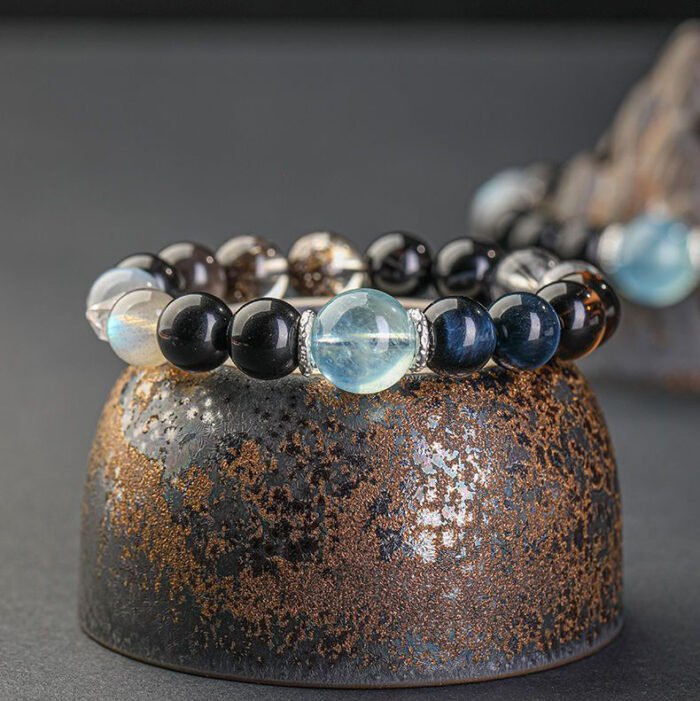 Multi – gemstone bracelets made of natural crystals and obsidian for balancing the five elements, replenishing water for those who lack water element among the five elements and have an affinity for water element.