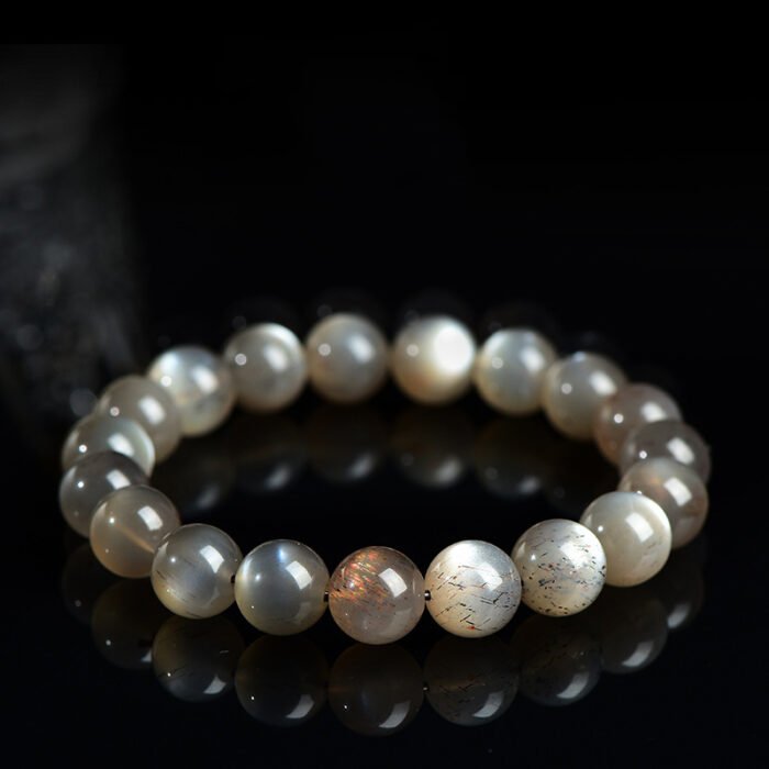 Black gold skeletal round bead crystal single-loop bracelet.