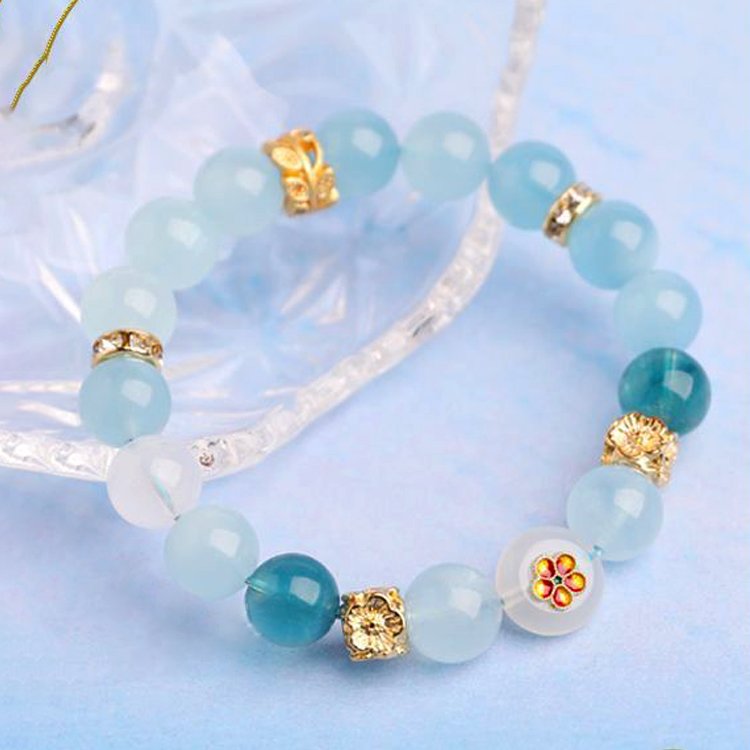 Aquamarine and white phantom quartz crystal bracelet with the design of “Four-sided Fortune Flower” - taoistcrystal.com Aquamarine and white phantom quartz crystal bracelet with the design of “Four-sided Fortune Flower”