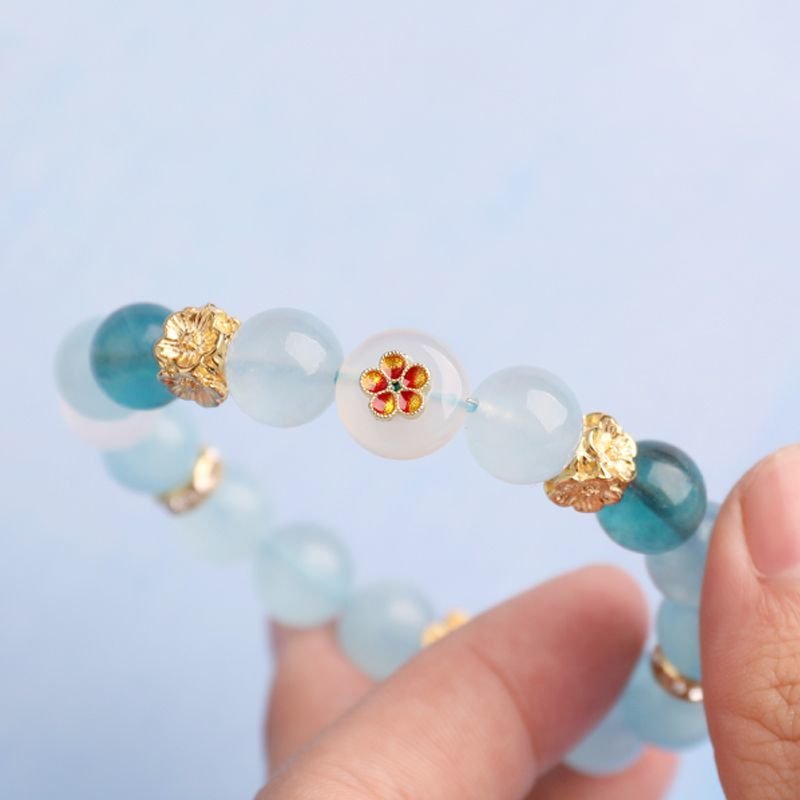 Aquamarine and white phantom quartz crystal bracelet with the design of “Four-sided Fortune Flower” - taoistcrystal.com Aquamarine and white phantom quartz crystal bracelet with the design of “Four-sided Fortune Flower”