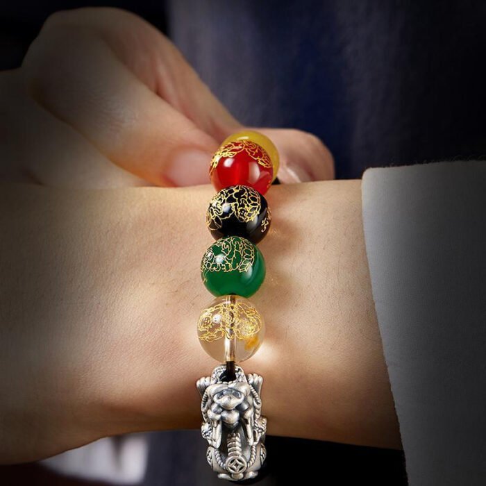 Natural tiger’s eye stone Five-way Wealth God silver pixiu bracelet.