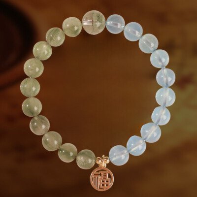 Crystal “Fu” – shaped charm bracelet for supplementing water & wood elements in the Wuxing theory