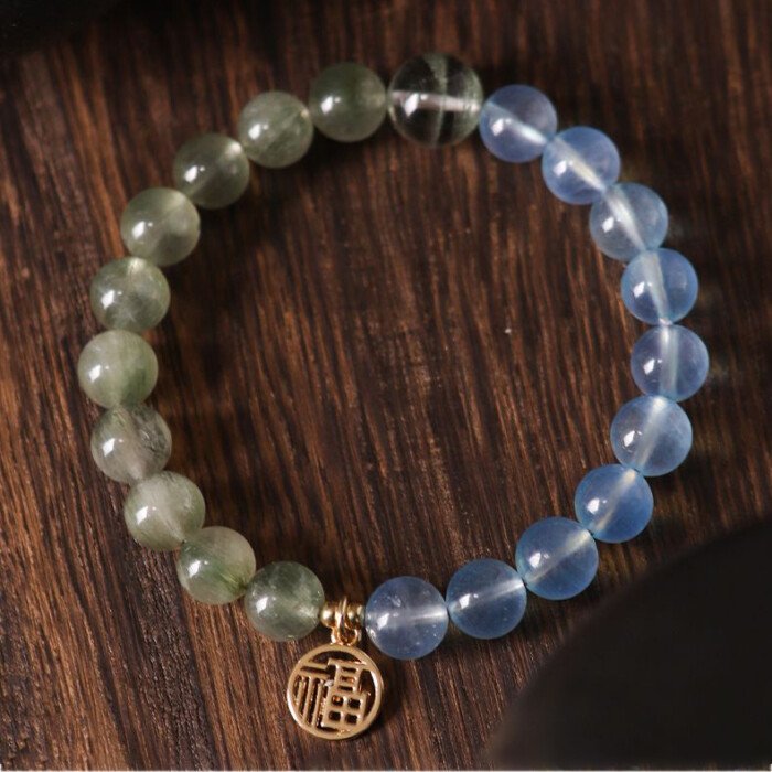 Crystal “Fu” – shaped charm bracelet for supplementing water & wood elements in the Wuxing theory