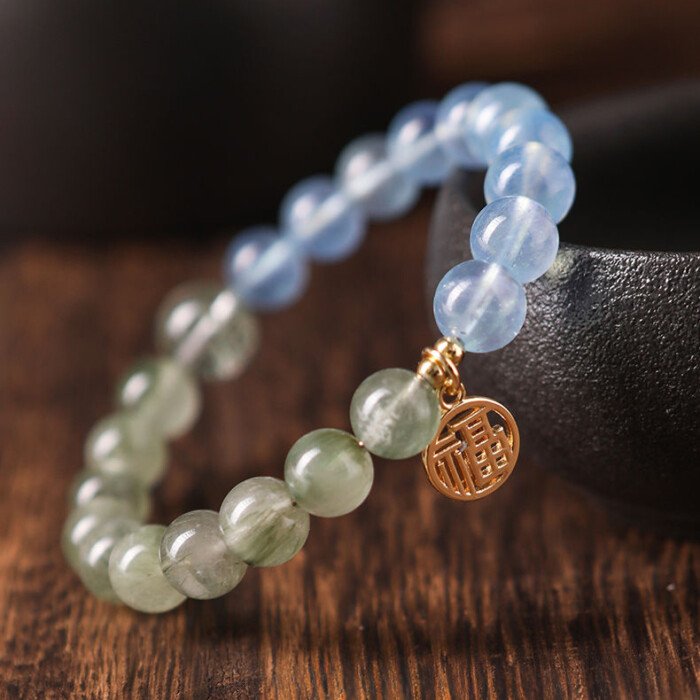 Crystal “Fu” – shaped charm bracelet for supplementing water & wood elements in the Wuxing theory
