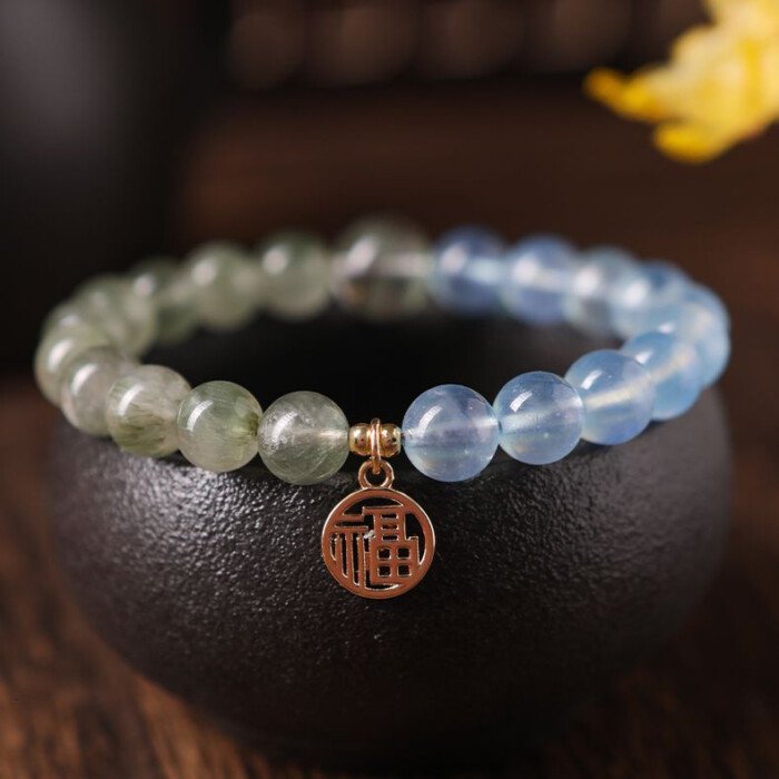 Crystal “Fu” – shaped charm bracelet for supplementing water & wood elements in the Wuxing theory