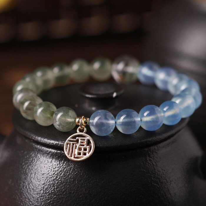 Crystal “Fu” – shaped charm bracelet for supplementing water & wood elements in the Wuxing theory
