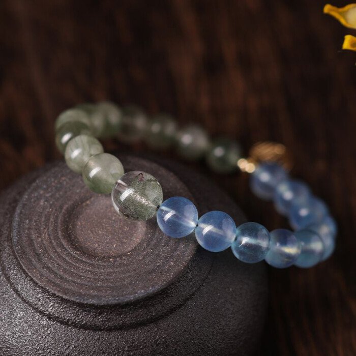 Crystal “Fu” – shaped charm bracelet for supplementing water & wood elements in the Wuxing theory