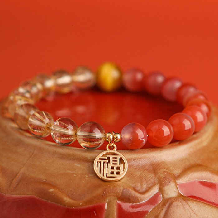 Crystal “Fu” – shaped charm bracelet for supplementing fire & earth elements in the Wuxing theory