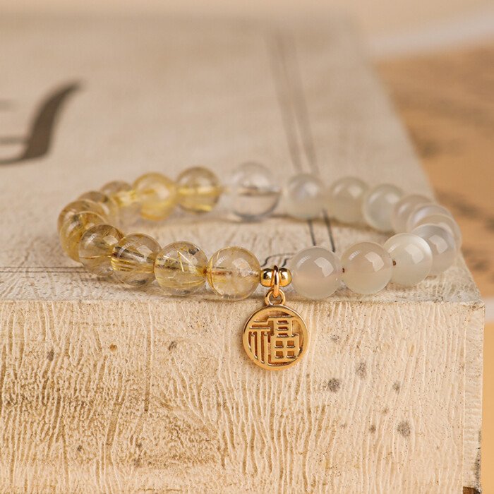 Crystal “Fu” – shaped charm bracelet for supplementing metal & earth elements in the Wuxing theory