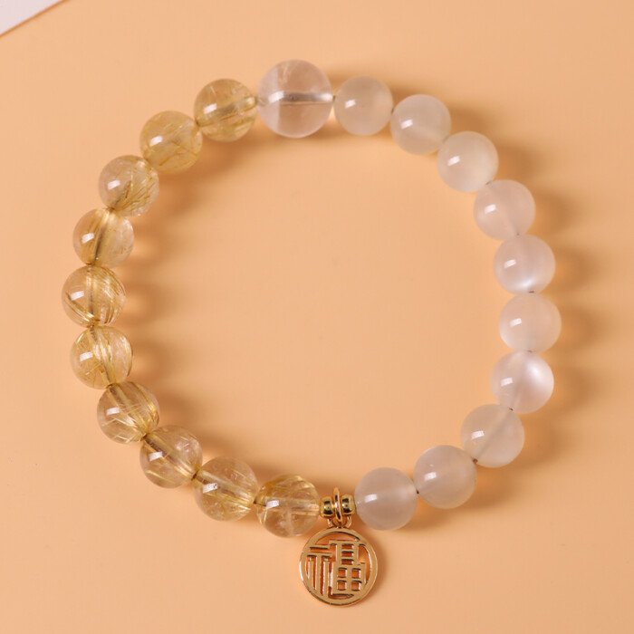 Crystal “Fu” – shaped charm bracelet for supplementing metal & earth elements in the Wuxing theory