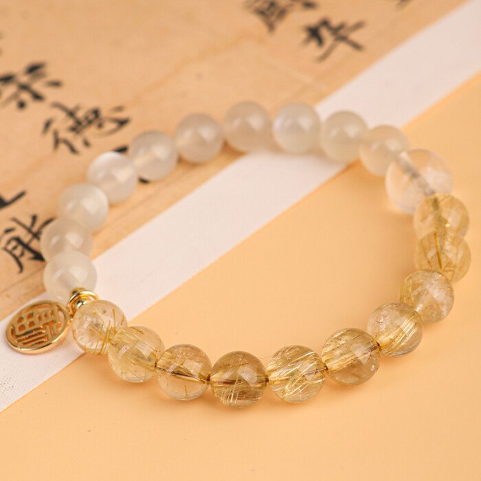 Crystal “Fu” – shaped charm bracelet for supplementing metal & earth elements in the Wuxing theory