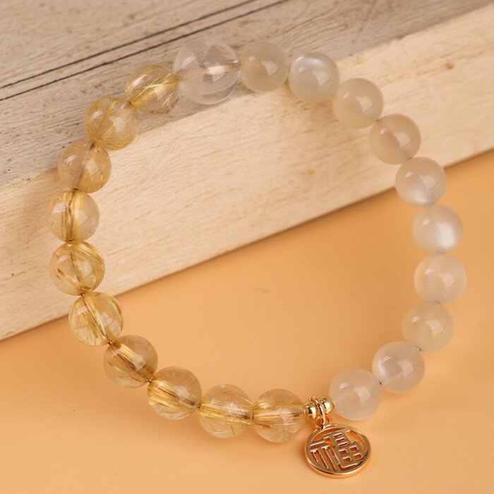 Crystal “Fu” – shaped charm bracelet for supplementing metal & earth elements in the Wuxing theory