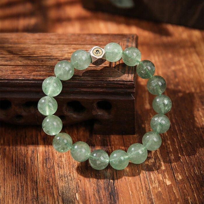 Natural green strawberry quartz hand string with zodiac signs of Rabbit, Dragon, and Horse, and figures of Samantabhadra, Mahasthamaprapta, and Manjushri.