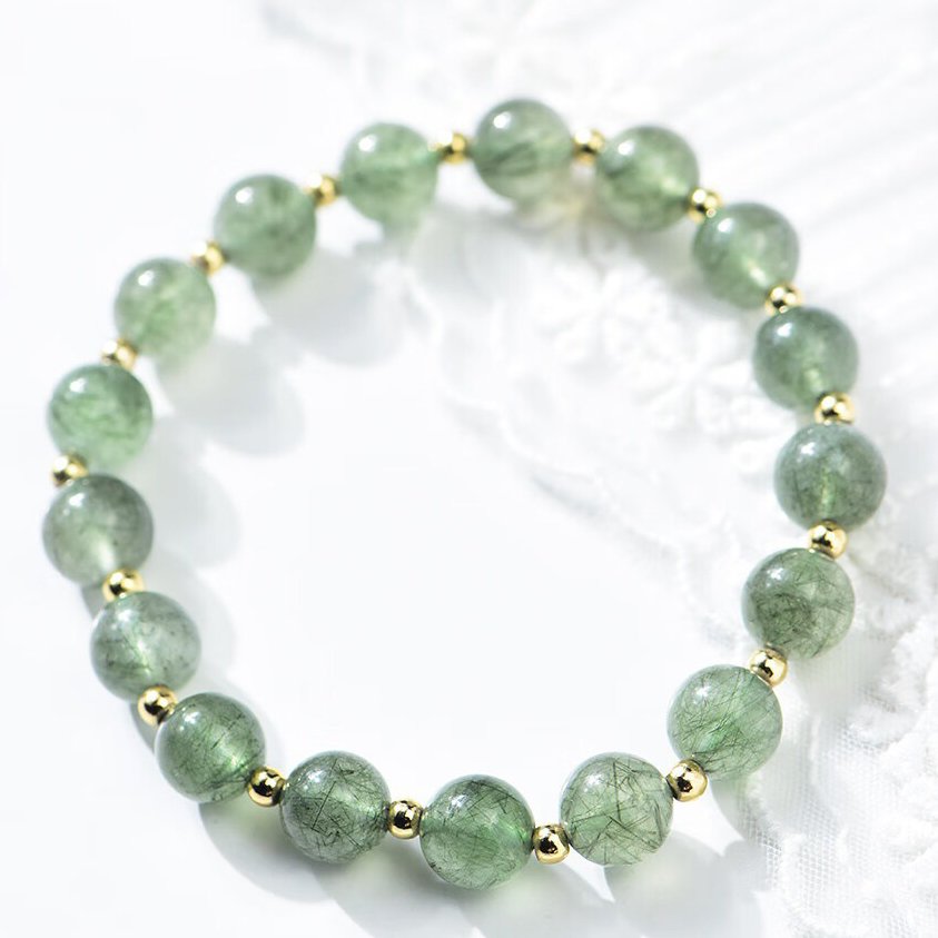 Single-loop bracelet made of green crystal raw stones for ladies, a Green Rutilated Quartz bracelet as a gift for girlfriends or besties.