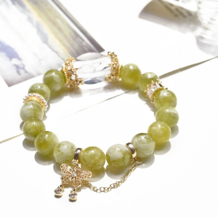 Xiu jade and white crystal butterfly bracelet for increasing self-confidence.