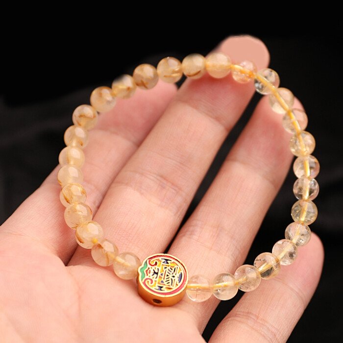 Natural golden rutilated quartz “full of gold and silver” bracelet.